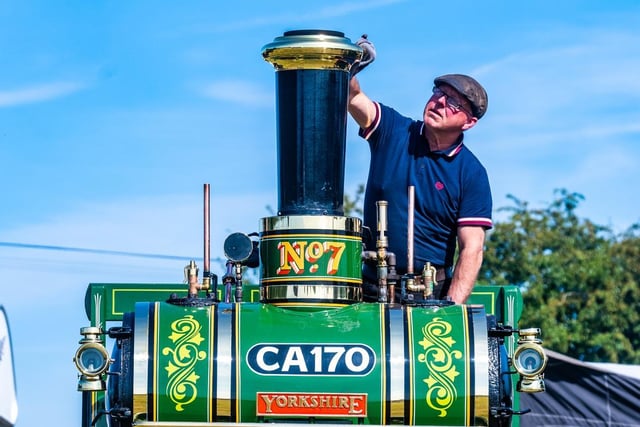 Andy Ward, of Upper Denby, cleaning a 1905 2 Ton Yorkshire Steam Wagon, thought to be the only one left in the world.