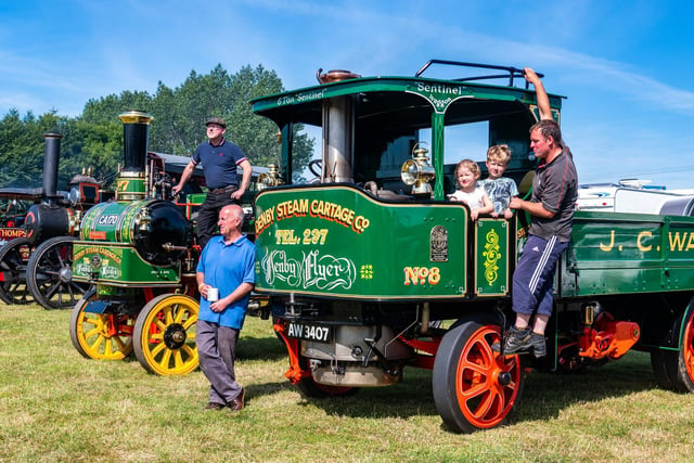 Three generations, (left to right) Andy Ward, of Upper Denby, on a 1905 2 Ton Yorkshire Steam Wagon, thought to be the only one left in the world, brother Darren Ward, and nephew Tom Ward, with his children Iris, 3, Alfie 5, on a 1916 Sentine Standard Steam Engine.