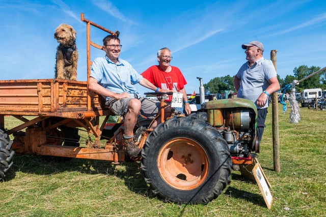 Pictured (left to right) James Platt, Martin Ellison (Steward), and Ray Gowlett, chat around a 1960 Pasquali Motoagricola, whilst Stanley watching form the trailer.