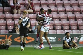 Wigan Warriors' Bevan French celebrates scoring their ninth try and his seventh of the game. Picture: Ed Sykes/SWpix.com