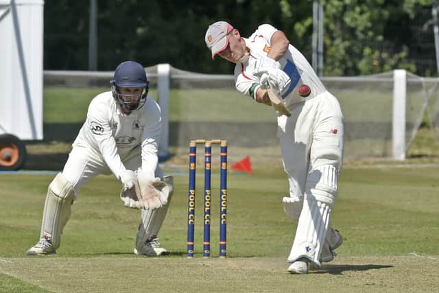 ON THE FRONT FOOT: Will Pallister hits four runs for Pool on his way to 124 not out  against Follifoot in Aire-Wharfe Division Two. Picture: Steve Riding.