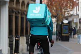 Deliveroo has slashed its annual sales outlook after revealing waning demand for takeaways as the cost-of-living crisis starts to bite.