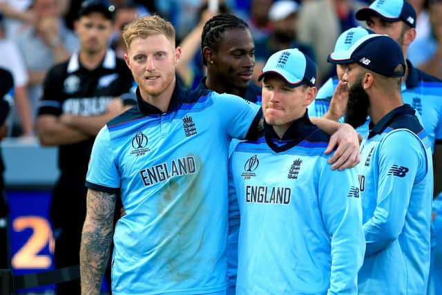 England's Ben Stokes (left) and Eoin Morgan celebrate their win after the match during the ICC World Cup Final. (Picture: Nick Potts/PA Wire)