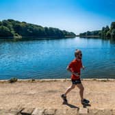 A runner enjoying the warm conditions whilst out in Roundhay Park on Monday (Image: James Hardisty)