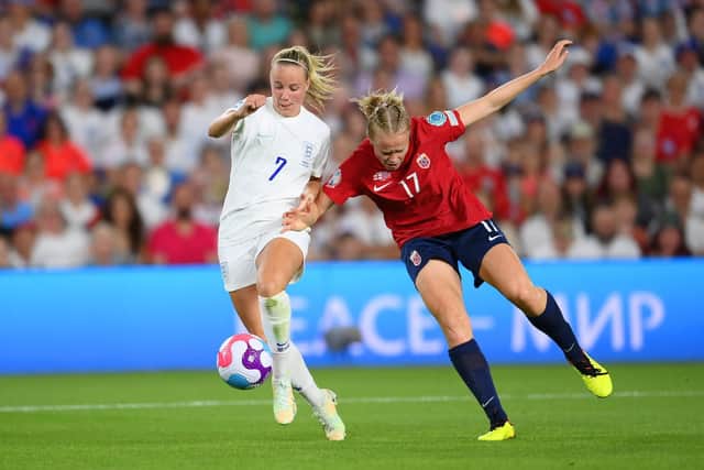 Beth Mead of England is challenged by Julie Blakstad of Norway during the UEFA Women's Euro 2022 group A match between England and Norway at Brighton & Hove Community Stadium on July 11, 2022 in Brighton, England. (Photo by Mike Hewitt/Getty Images)