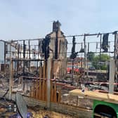 The scene after a blaze in Barnsley, South Yorkshire, after temperatures topped 40C in the UK for the first time ever, as the sweltering heat fuelled fires and widespread transport disruption.