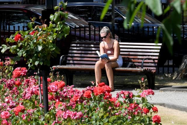 A woman enjoying the recent hot weather in Leeds.