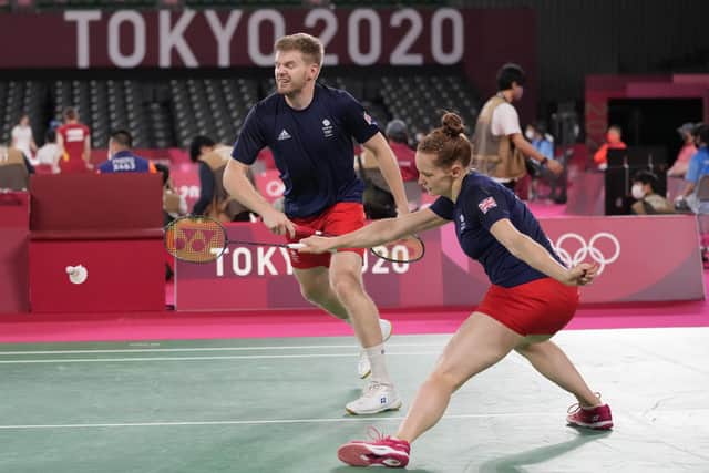 Britain's Marcus Ellis and Lauren Smith play against Hong Kong's Tang Chun Man and Tse Ying Suet at the 2020 Olympics in Tokyo. Picture: AP/Dita Alangkara