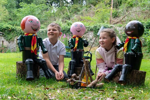 Alfie and Saskia, 9, join the Scout camp fire. The Settle Flower Pot Festival. Picture Bruce Rollinson