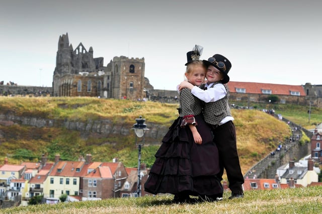 Isabella Hayton with her brother Matthew, aged 5, pictured with the Abbey in the background.