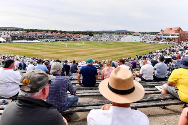 KEEP IT: Spectators look on at Scarborough during the match between Yorkshire and Surrey. Picture by Will Palmer/SWpix.com