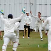 North Leeds bowler Tom Alldred celebrates after bowling Bilton opener Chris Pierson for four in the first over. Picture: Steve Riding.