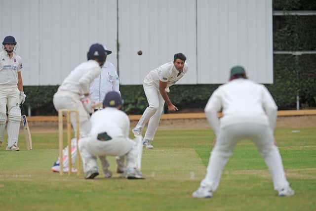 Farrukh Alam  of Carlton runs in to bowl against Bradford League Division One rivals Pudsey Congs. Picture Steve Riding