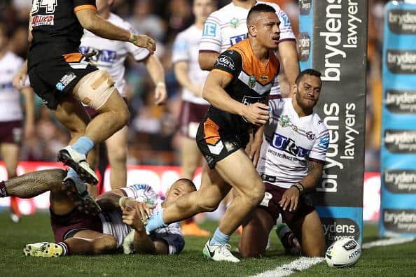Sauaso Sue scores a try for Wests Tigers. (Picture: SWPix.com)