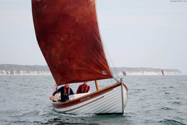 The double-ender Crystal Sea looking splended under sail. Photo courtesy of Paul L Arro