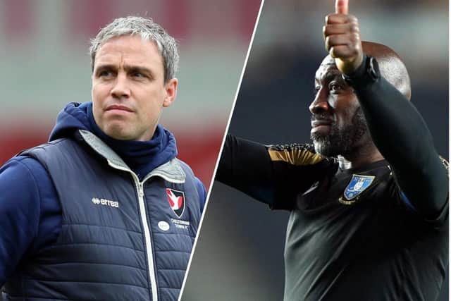 RIVALS: Barnsley's Michael Duff and Sheffield Wednesday coach, Darren Moore (right).