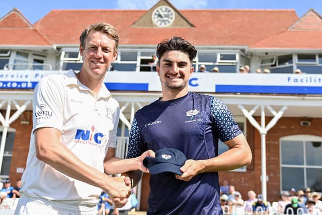 Yorkshire's captain, Steve Patterson (L) presents Jordan Thompson with his first team cap ahead of the match against Surrey earlier this month (Picture: SWPix.com)