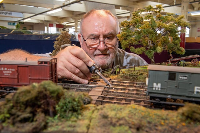 Charles Oldroyd carries out a bit of maintenance on a track at the Keighley club.
