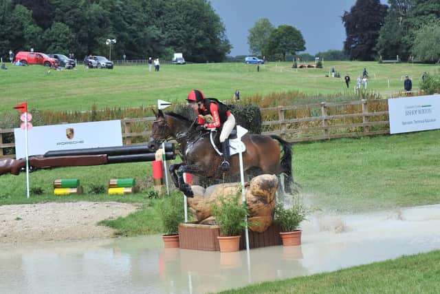 A rider takes on a water jump at a previous event at Bishop Burton.