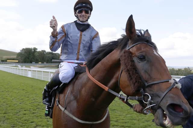 Victory salute: Summerghand's jockey Danny Tudhope after winning the Unibet Stewards' Cup. Picture: Dan Abraham/PA Wire.