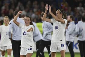 England's Ella Toone, centre, and England's Jill Scott, right, celebrate beating Sweden at Bramall Lane in Tuesday night's semi-final. Picture: AP/Rui Vieira
