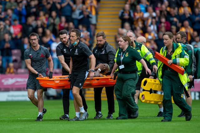 Bradford City debutant Emmanuel Osadebe is stretchered off in Bradford City's controversial derby draw with Doncaster Rovers. Picture: Bruce Rollinson.
