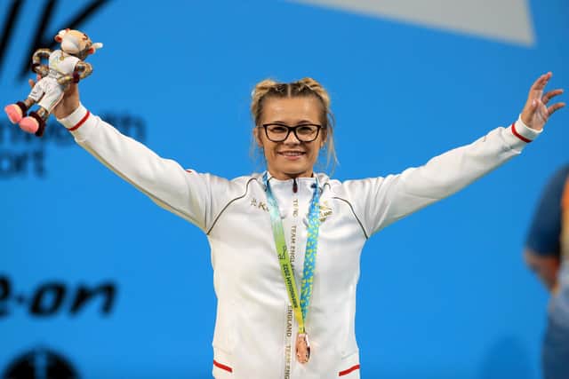 PODIUM PLACE: Bronze Medalist England’s Fraer Morrow on the podium after the Women’s 55kg Weightlifting Competition at The NEC on day two of the 2022 Commonwealth Games in Birmingham. Picture: PA Wire.