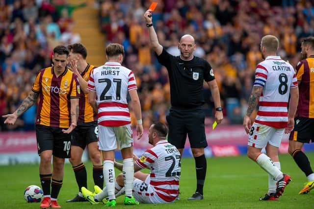 Off you go: Two yellow cards in quick succession saw Doncaster debutant Lee Tomlin sent off. Picture: Bruce Rollinson