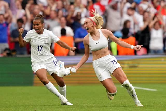 Winners: England's Chloe Kelly, right, celebrates with Nikita Parris after scoring the winning goal in the UEFA Women's Euro 2022 final at Wembley. Picture: Jonathan Brady/PA Wire.