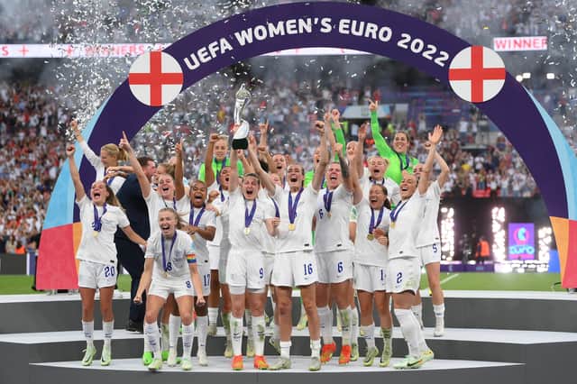 Victory roar: England captain Leah Williamson lifts the UEFA Women's EURO 2022 Trophy with the rest of the jubilant squad. Picture: Shaun Botterill/Getty Images)