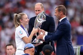Wait is over: Aleksander Ceferin, President of UEFA and Prince William, Duke of Cambridge hand the UEFA Women's Euro Trophy to Leah Williamson captain of England. (Photo by Mike Hewitt/Getty Images)