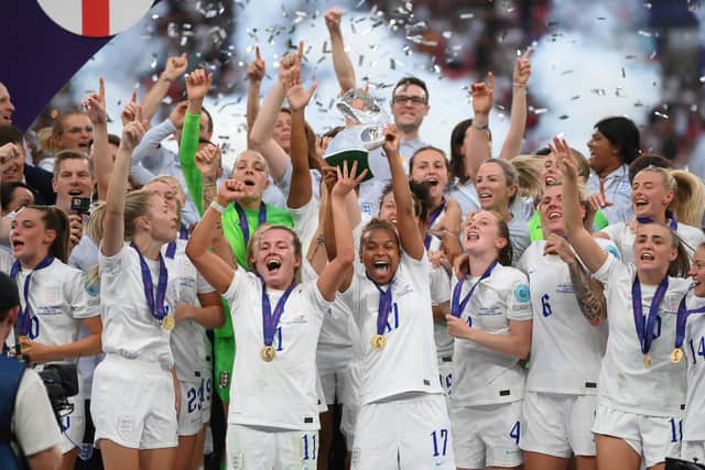 Team effort: Leah Williamson and the England squad celebrate with the trophy. (Photo by Shaun Botterill/Getty Images)
