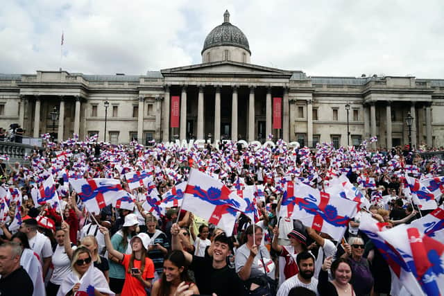 Party time: England fans during a fan celebration to commemorate England's historic UEFA Women's EURO 2022 triumph in Trafalgar Square, London yesterday.  Picture: Aaron Chown/PA Wire.