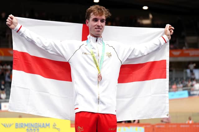 Wakefield's Ollie Wood celebrates with his bronze medal on the podium after the Men's 40km Points Race Finals at the Commonwealth Games. Picture: John Walton/PA