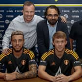 Leeds United trio Sam Greenwood (front left), Joe Gelhardt (centre) and Crysencio Summerville (right). Pictured in the back row, left to right, are CEO Angus Kinnear, director of football Victor Orta and chairman Andrea Radrizzani. Picture courtesy of LUFC