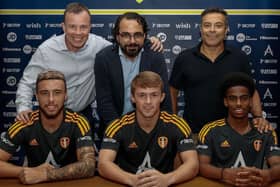 Leeds United trio Sam Greenwood (front left), Joe Gelhardt (centre) and Crysencio Summerville (right). Pictured in the back row, left to right, are CEO Angus Kinnear, director of football Victor Orta and chairman Andrea Radrizzani. Picture courtesy of LUFC