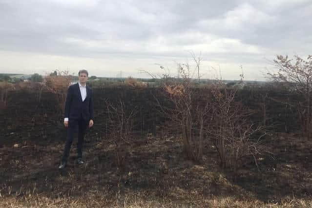 Doncaster North MP Ed Miliband at the scene of trees destroyed in a wildfire which were planted last November.