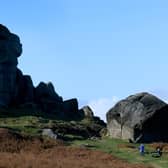 Visitors to the Cow and Calf Rocks at Ilkley Moor. Picture: Gary Longbottom.
