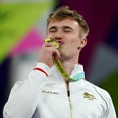 GOLDEN BOY: Jack Laugher kisses his gold medal after winning  the Men's 1m Springboard Final at the 2022 Commonwealth Games in Birmingham. Picture: Mike Egerton/PA