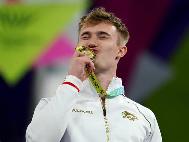 GOLDEN BOY: Jack Laugher kisses his gold medal after winning  the Men's 1m Springboard Final at the 2022 Commonwealth Games in Birmingham. Picture: Mike Egerton/PA
