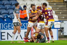 Huddersfield Giants celebrate Theo Fages' try. (Picture: Bruce Rollinson)