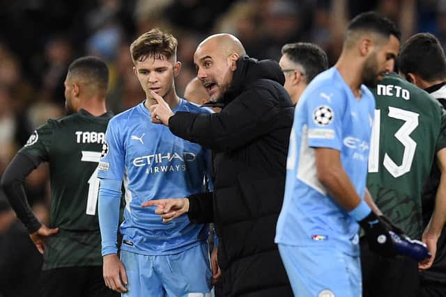 Manchester City's Spanish manager Pep Guardiola gives instructions to midfielder James McAtee during the UEFA Champions League round of 16 second leg football match against Sporting Lisbon at the Etihad Stadium in March. Picture: Oli Scarff/AFP via Getty Images