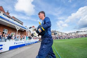 Idyllic backdrop: George Hill walks back to the pavillion with the applause of more than 3,000 people ringing in his ears after his first century in one-day cricket for Yorkshire set the tone for a victory over Worcestershire at the famous North Marine Road, Scarborough Cricket Club. (Picture: Allan/Mckenzie/SWPix.com)