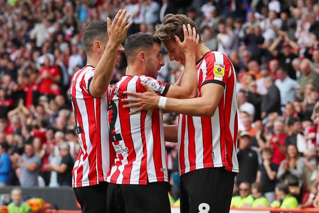 Sander Berge, right, celebrates with his Sheffield United team-mates (Picture: Simon Bellis / Sportimage)
