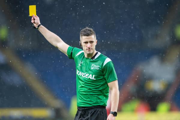 Chris Kendall brandishes a yellow card. (Picture: SWPix.com)