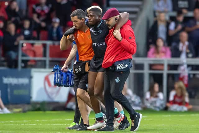 Jermaine McGillvary is helped from the field after sustaining a knee injury. (Picture: SWPix.com)