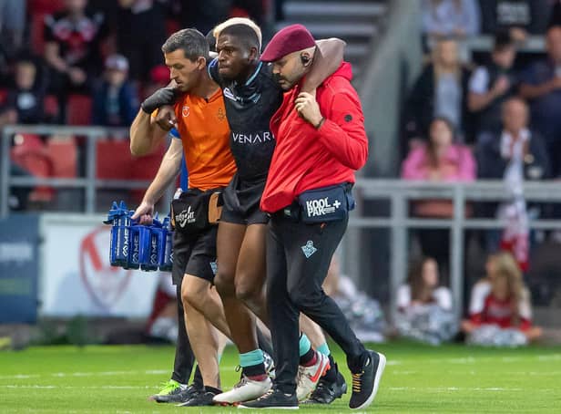 Jermaine McGillvary is helped from the field after sustaining a knee injury. (Picture: SWPix.com)