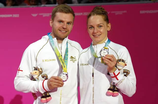 England's Marcus Ellis and Lauren Smith after winning silver in the Mixed Doubles Badminton. Picture: Zac Goodwin/PA