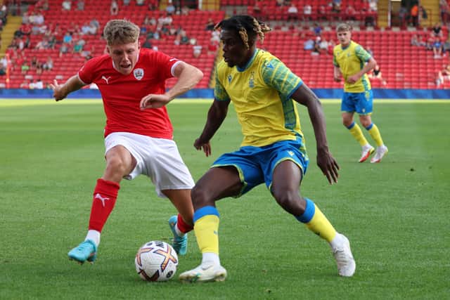 Barnsley teenager Aiden Marsh, tackling Nottingham Forest’s Alex Might during a pre-season friendly at Oakwell, is eager to learn.Picture: Nigel Roddis/Getty Images