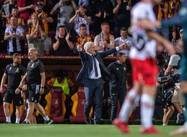 Bradford City manager Mark Hughes celebrates at full time after a thrilling League Cup win over Hull City on Tuesday night.   Picture Bruce Rollinson